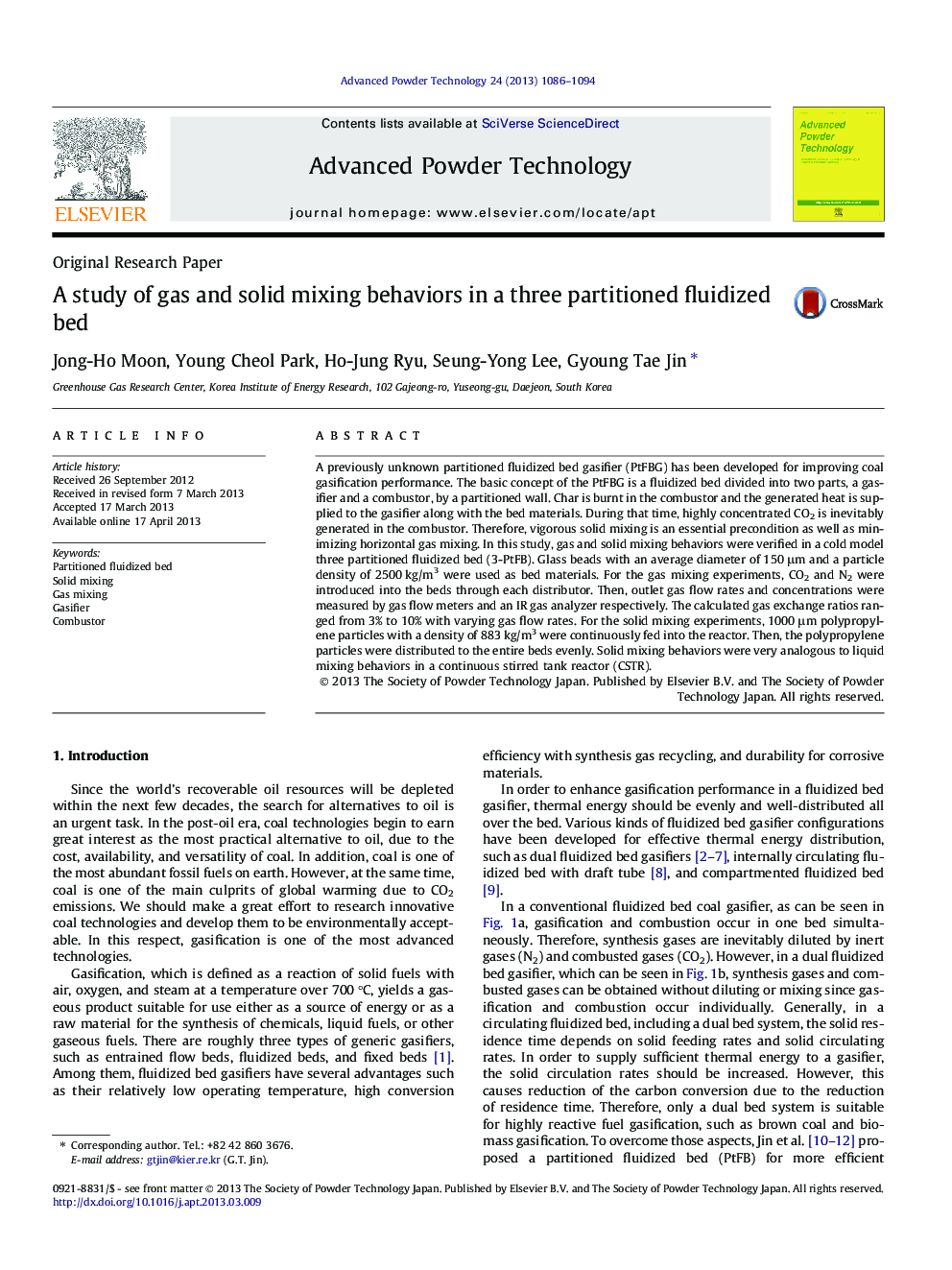 A study of gas and solid mixing behaviors in a three partitioned fluidized bed