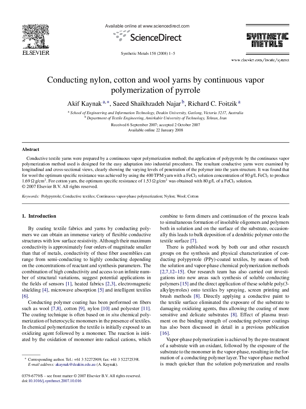 Conducting nylon, cotton and wool yarns by continuous vapor polymerization of pyrrole