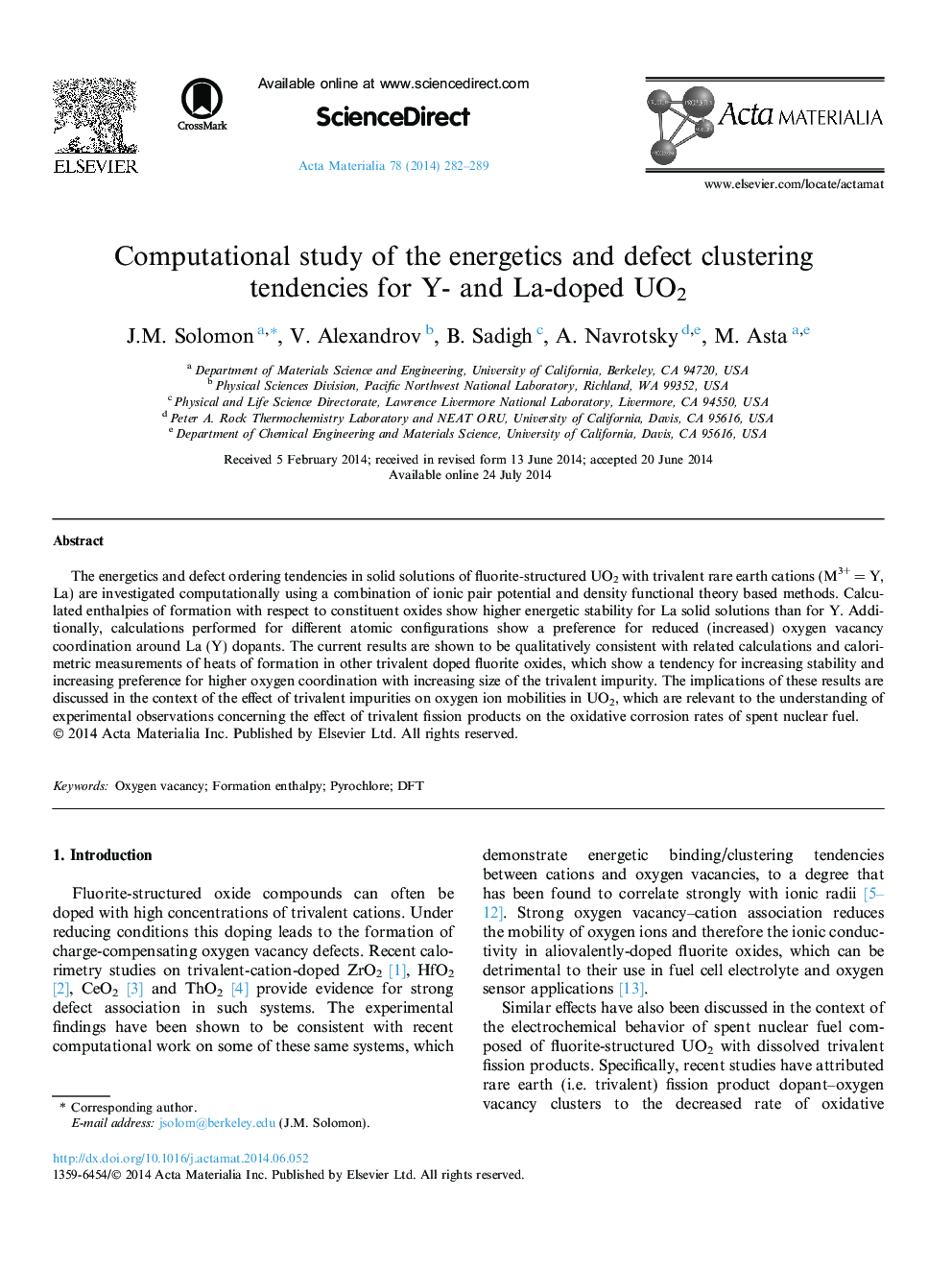 Computational study of the energetics and defect clustering tendencies for Y- and La-doped UO2