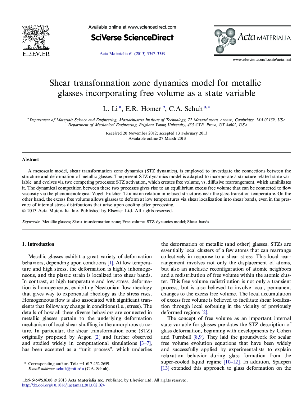 Shear transformation zone dynamics model for metallic glasses incorporating free volume as a state variable