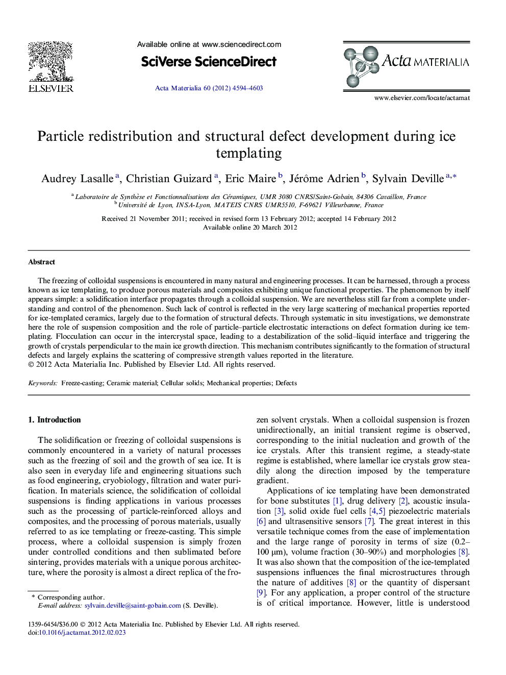 Particle redistribution and structural defect development during ice templating