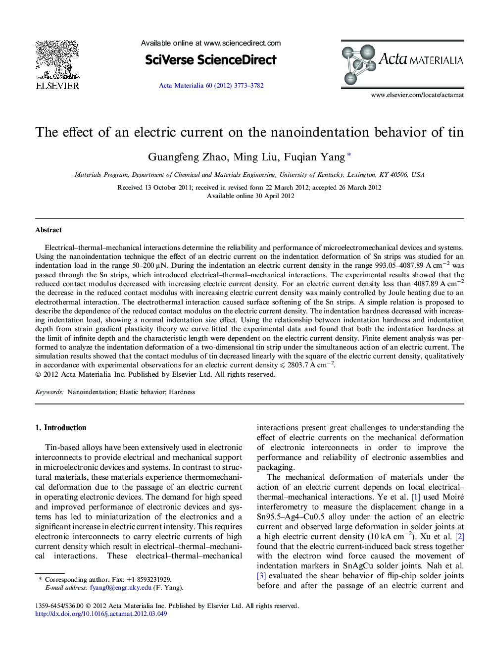 The effect of an electric current on the nanoindentation behavior of tin