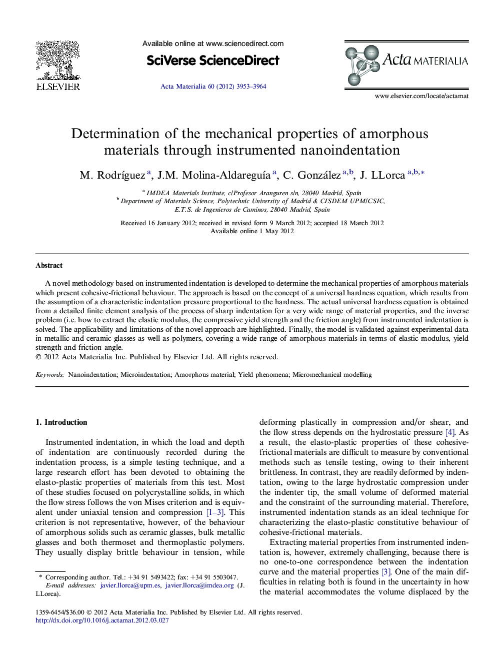 Determination of the mechanical properties of amorphous materials through instrumented nanoindentation