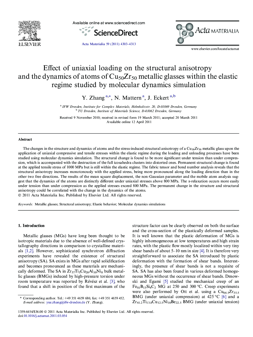 Effect of uniaxial loading on the structural anisotropy and the dynamics of atoms of Cu50Zr50 metallic glasses within the elastic regime studied by molecular dynamics simulation