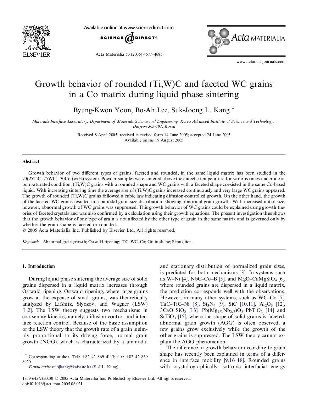 Growth behavior of rounded (Ti,W)C and faceted WC grains in a Co matrix during liquid phase sintering