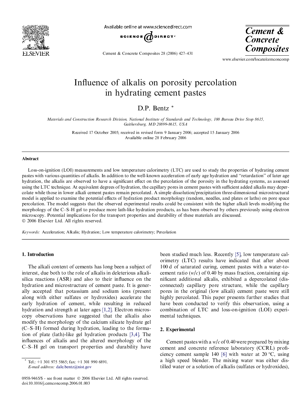 Influence of alkalis on porosity percolation in hydrating cement pastes