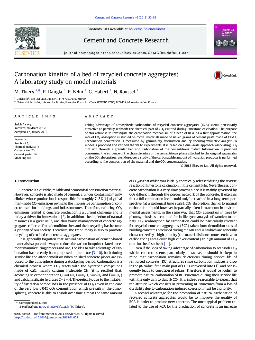 Carbonation kinetics of a bed of recycled concrete aggregates: A laboratory study on model materials