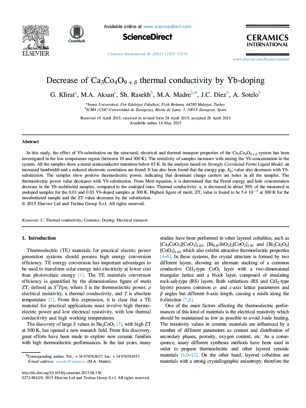 Decrease of Ca3Co4O9+δ thermal conductivity by Yb-doping