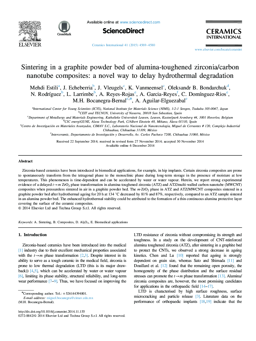 Sintering in a graphite powder bed of alumina-toughened zirconia/carbon nanotube composites: a novel way to delay hydrothermal degradation