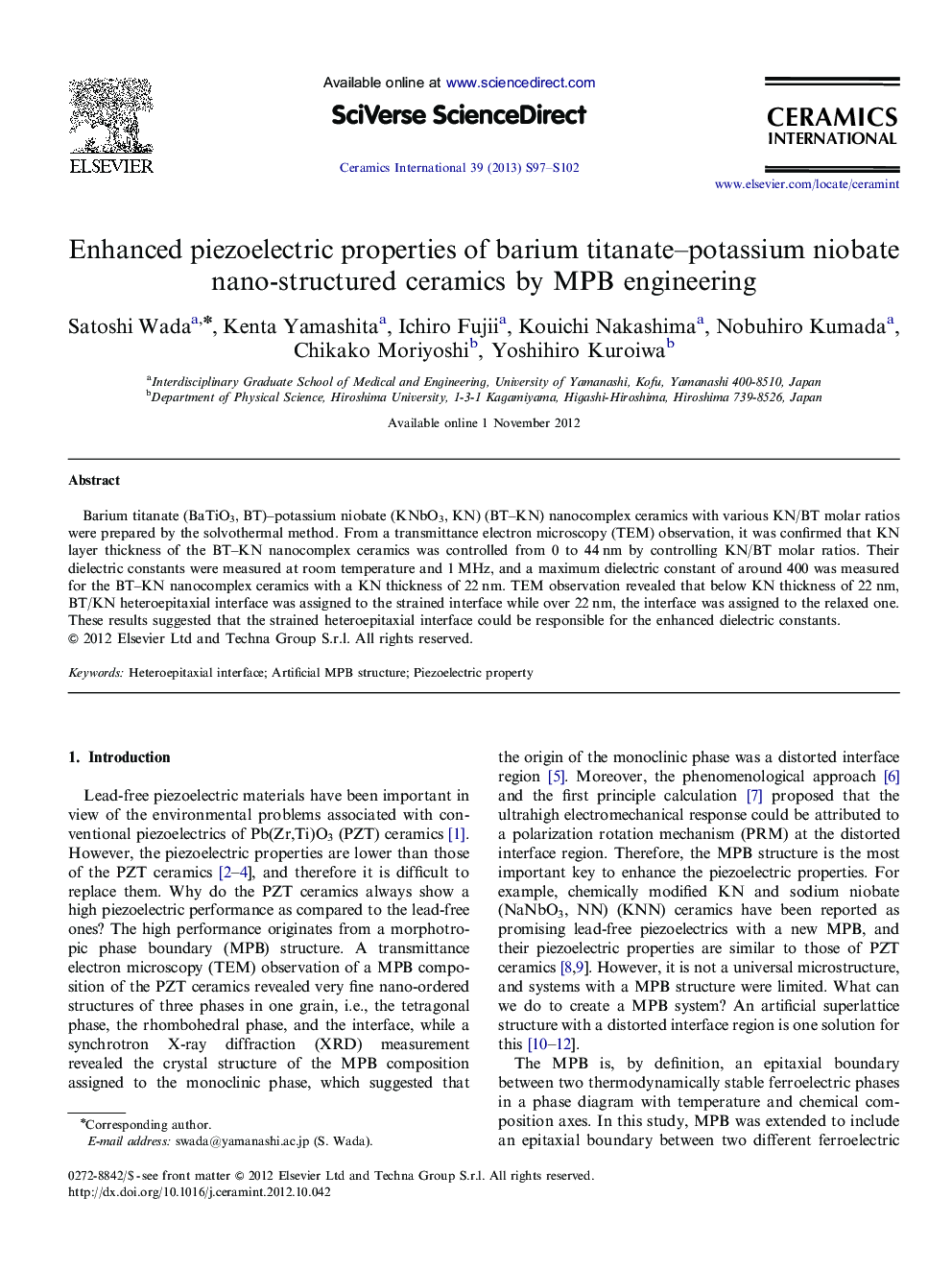 Enhanced piezoelectric properties of barium titanate–potassium niobate nano-structured ceramics by MPB engineering