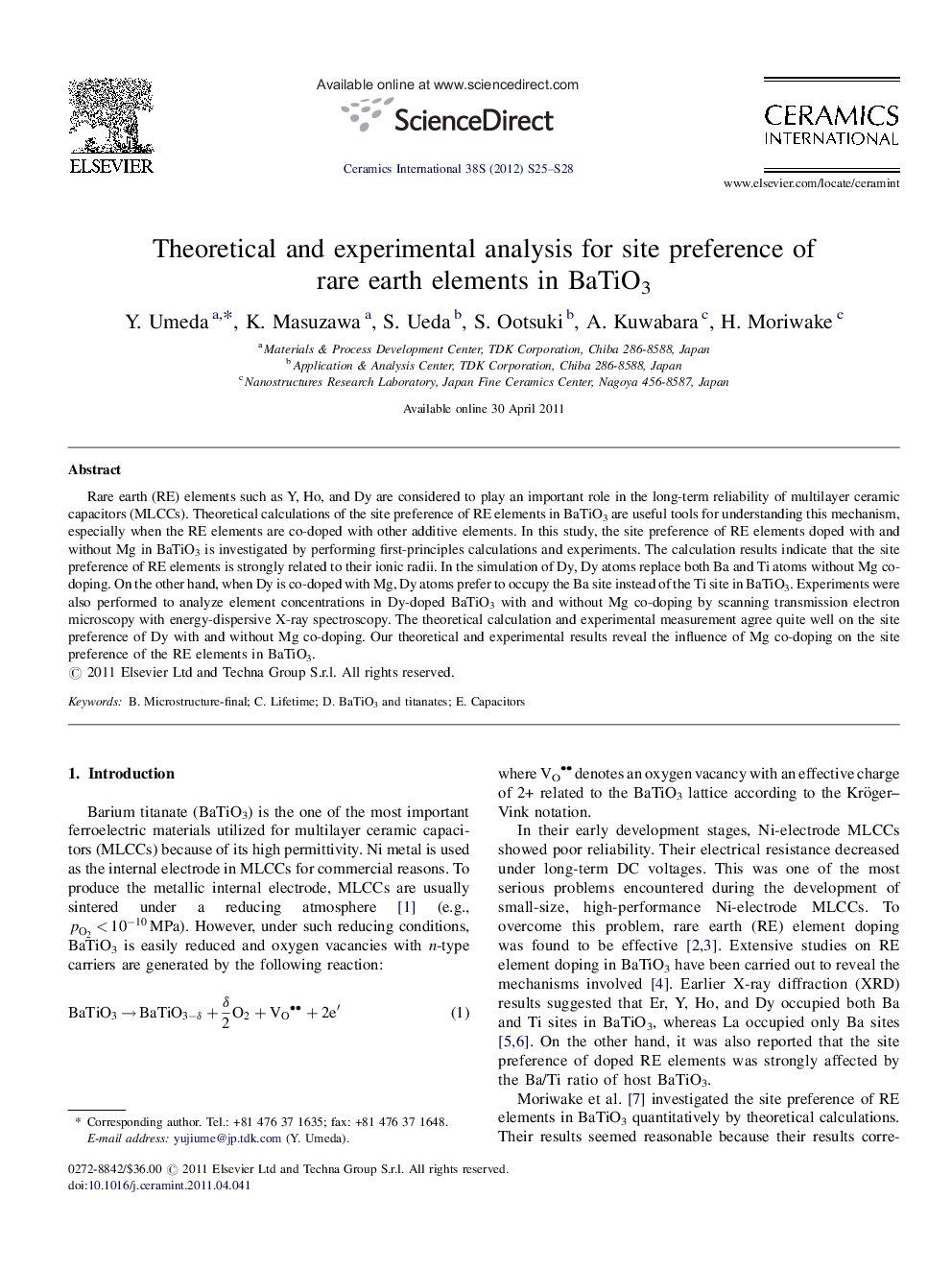 Theoretical and experimental analysis for site preference of rare earth elements in BaTiO3