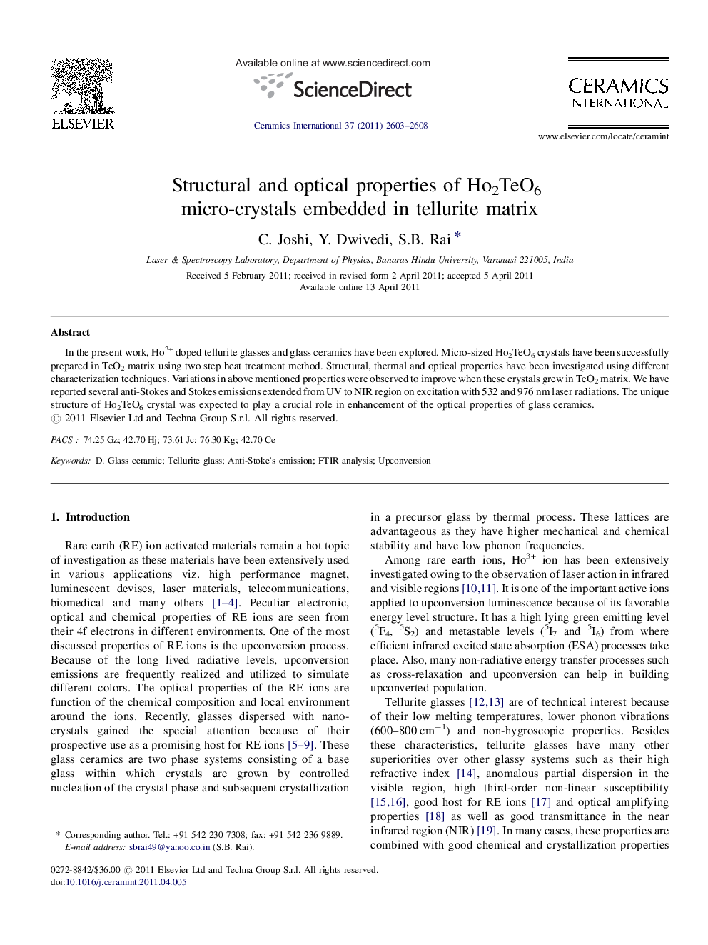 Structural and optical properties of Ho2TeO6 micro-crystals embedded in tellurite matrix