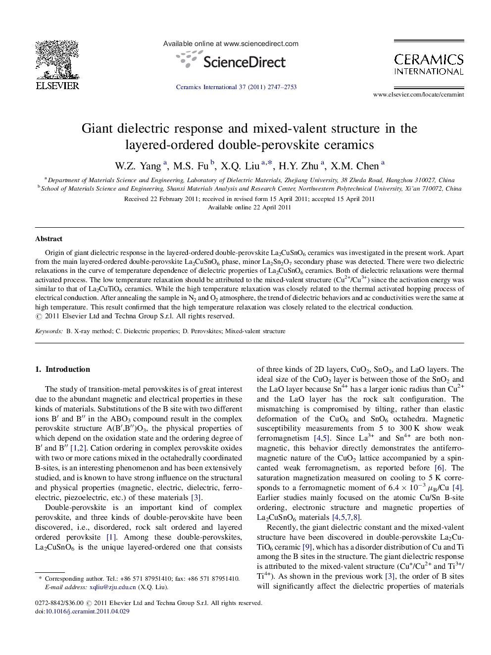 Giant dielectric response and mixed-valent structure in the layered-ordered double-perovskite ceramics