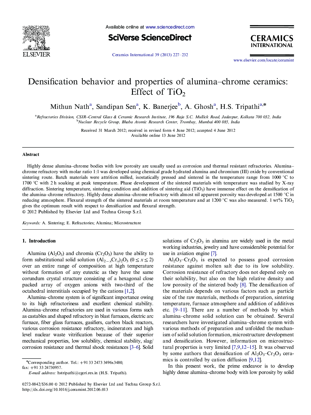 Densification behavior and properties of alumina–chrome ceramics: Effect of TiO2