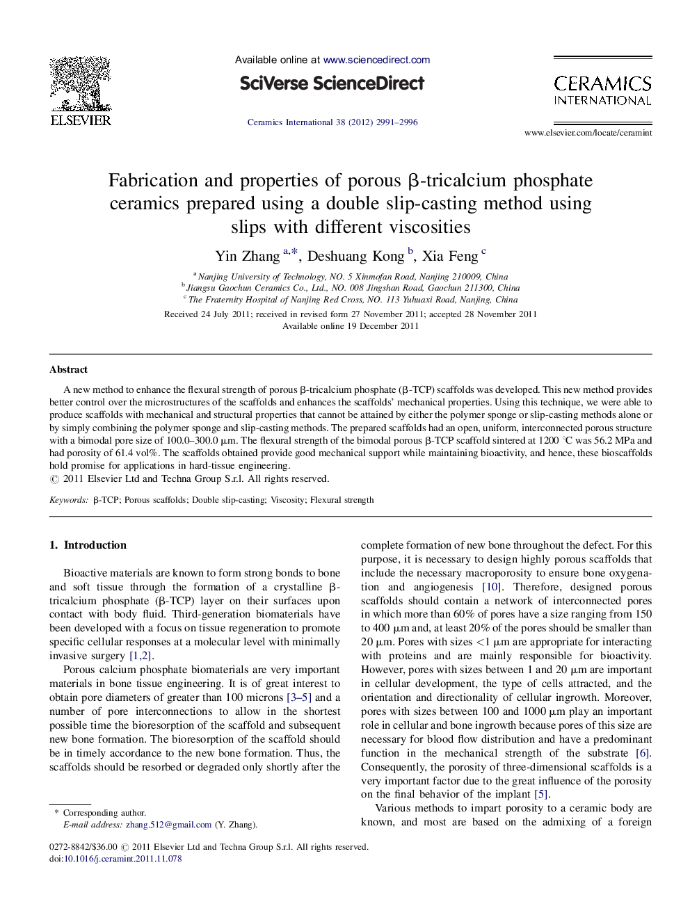 Fabrication and properties of porous β-tricalcium phosphate ceramics prepared using a double slip-casting method using slips with different viscosities