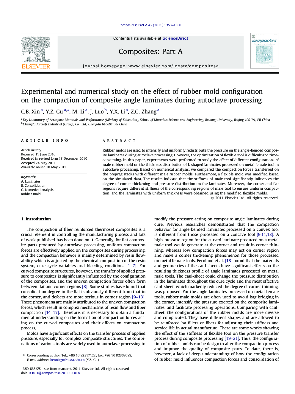 Experimental and numerical study on the effect of rubber mold configuration on the compaction of composite angle laminates during autoclave processing