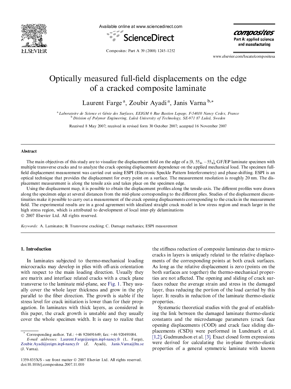 Optically measured full-field displacements on the edge of a cracked composite laminate