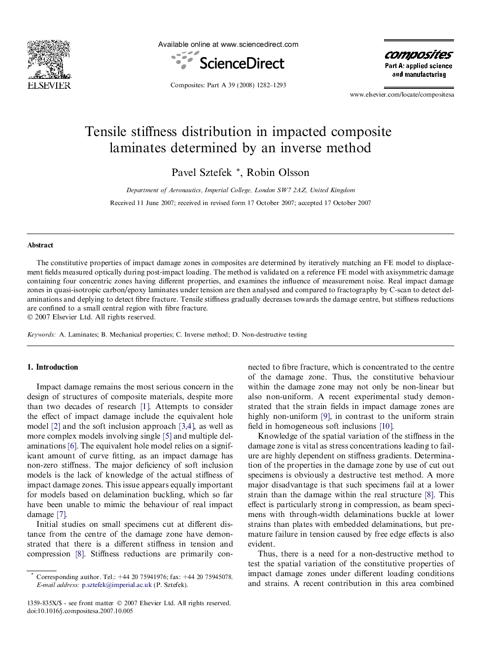 Tensile stiffness distribution in impacted composite laminates determined by an inverse method