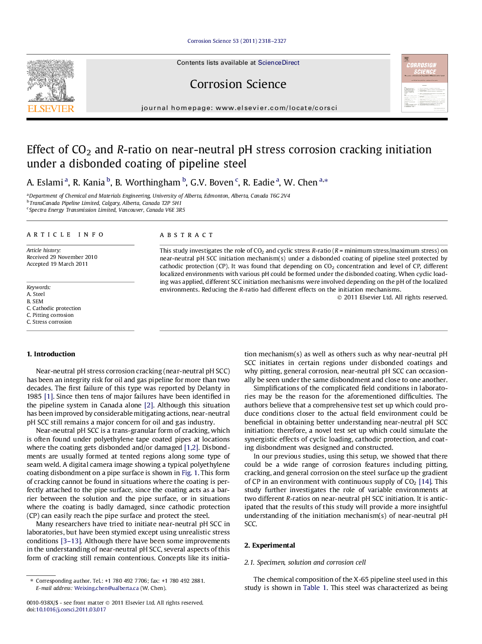 Effect of CO2 and R-ratio on near-neutral pH stress corrosion cracking initiation under a disbonded coating of pipeline steel