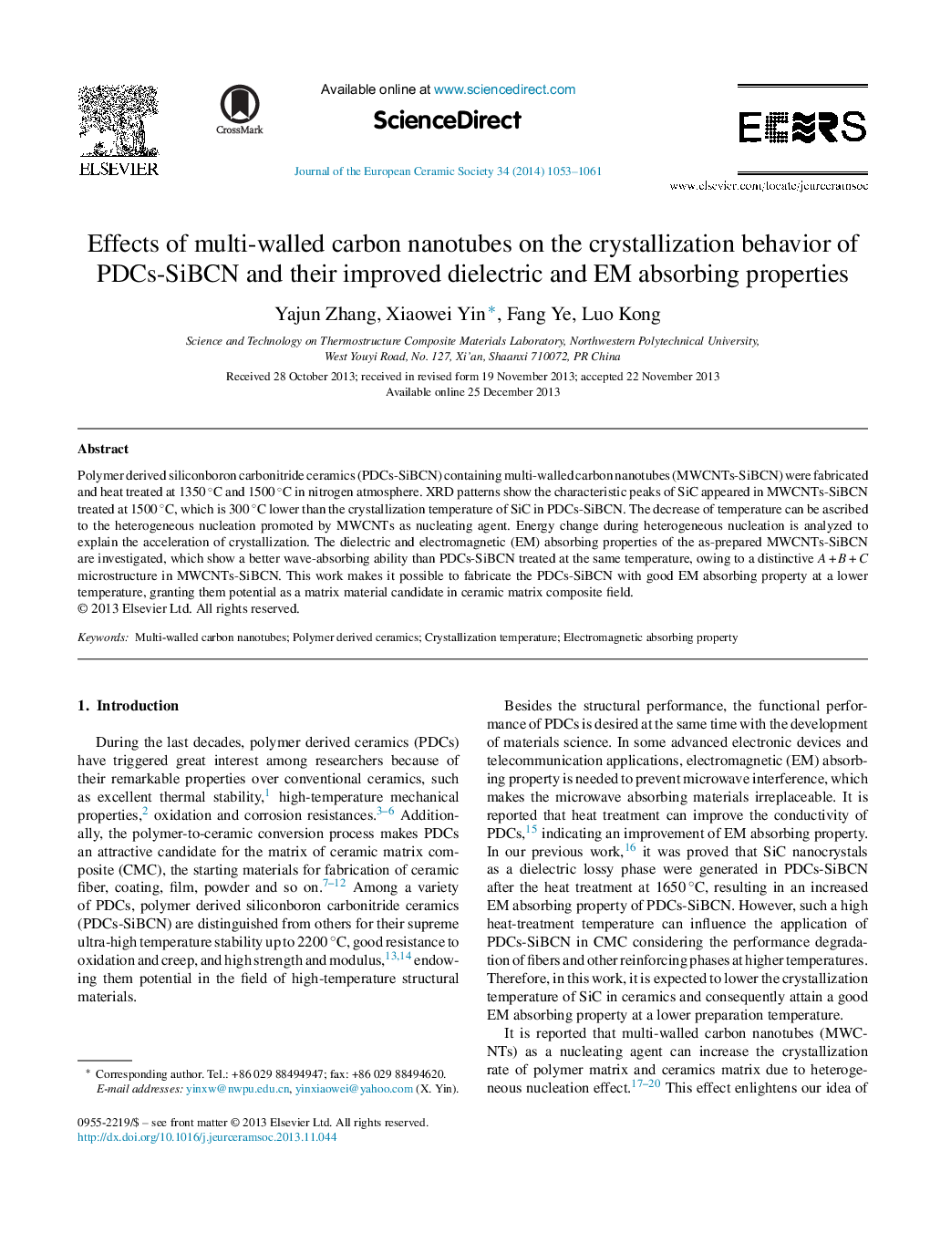 Effects of multi-walled carbon nanotubes on the crystallization behavior of PDCs-SiBCN and their improved dielectric and EM absorbing properties