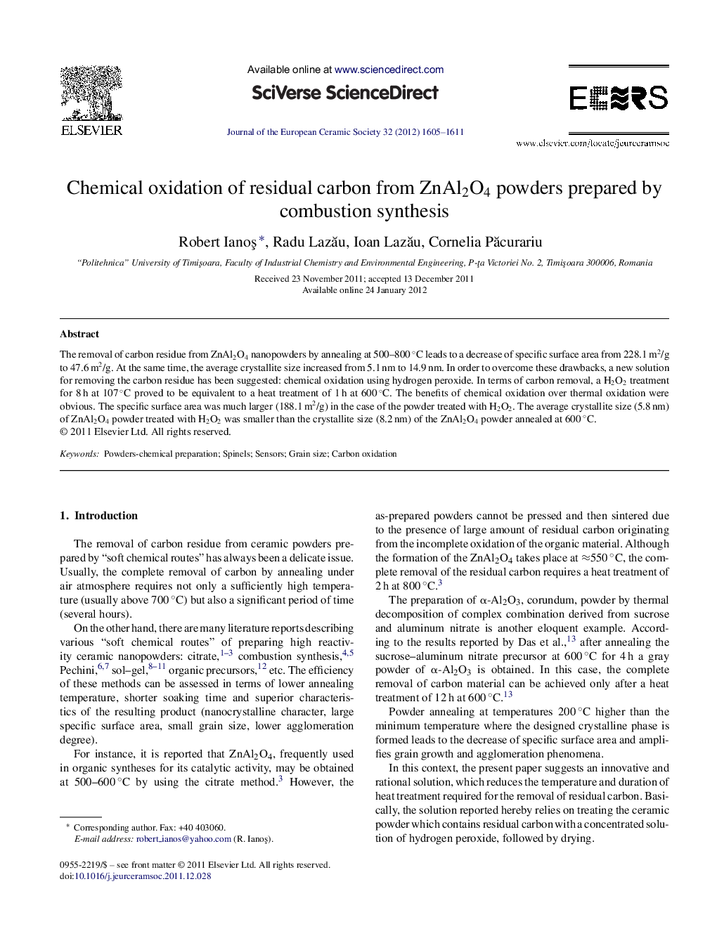 Chemical oxidation of residual carbon from ZnAl2O4 powders prepared by combustion synthesis