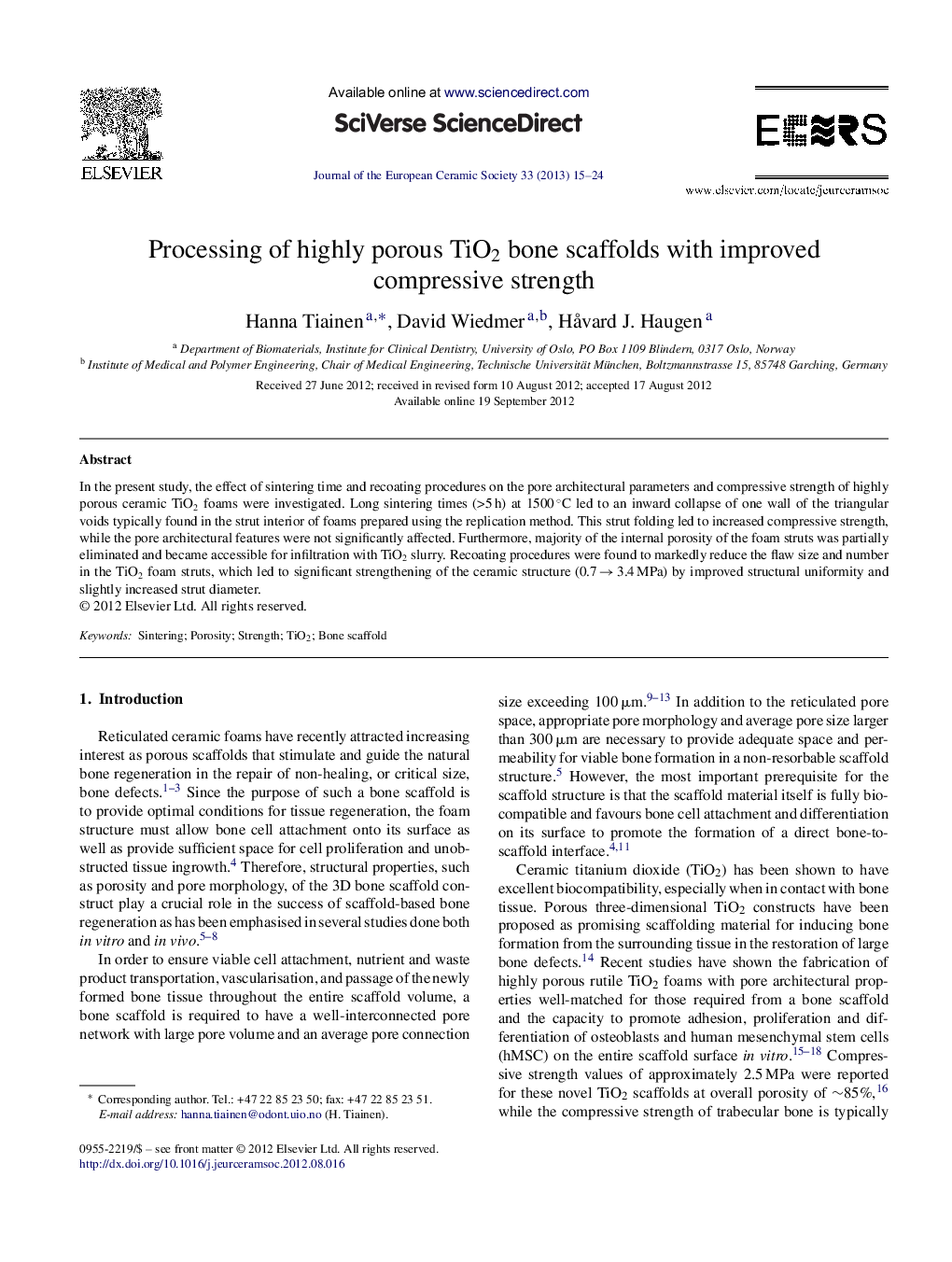 Processing of highly porous TiO2 bone scaffolds with improved compressive strength