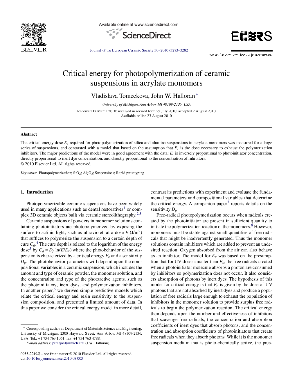 Critical energy for photopolymerization of ceramic suspensions in acrylate monomers