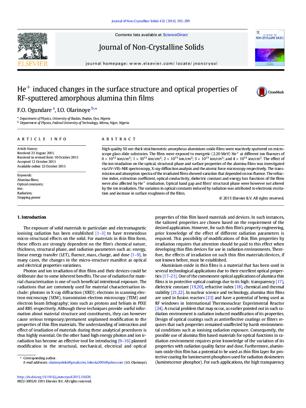 He+ induced changes in the surface structure and optical properties of RF-sputtered amorphous alumina thin films