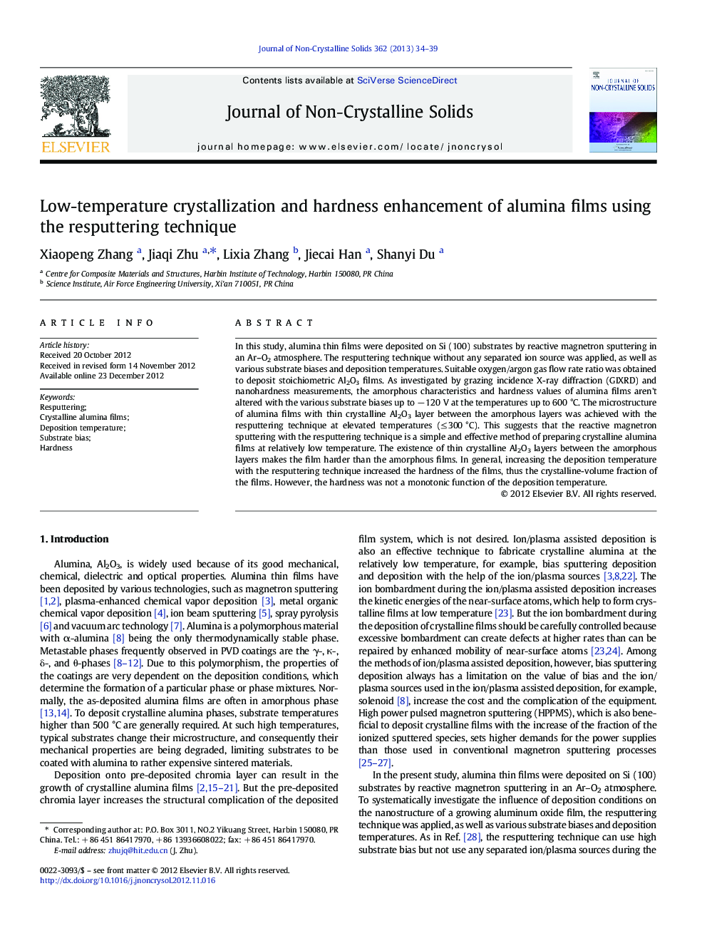 Low-temperature crystallization and hardness enhancement of alumina films using the resputtering technique