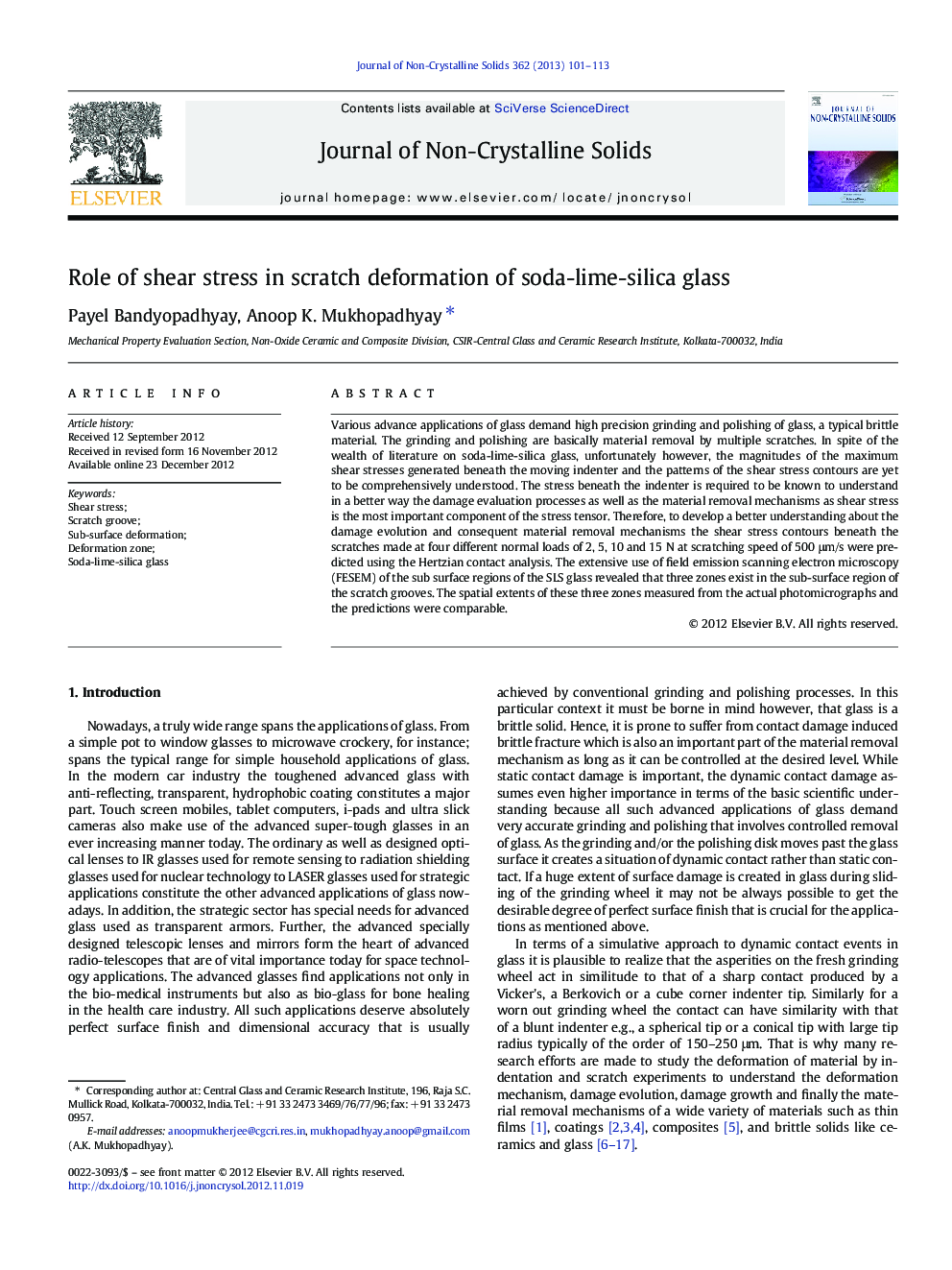 Role of shear stress in scratch deformation of soda-lime-silica glass