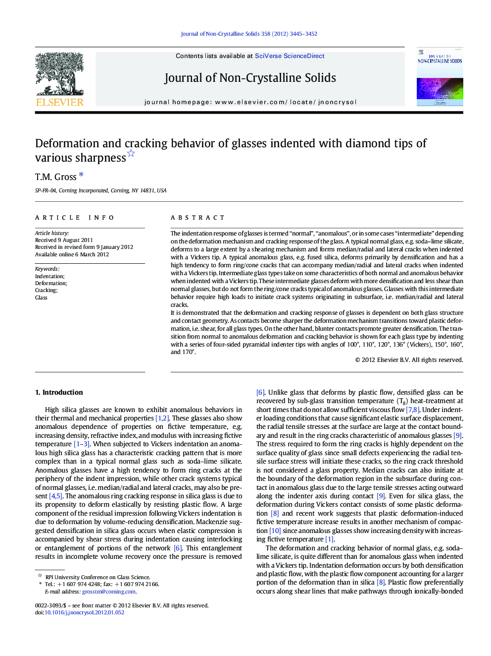 Deformation and cracking behavior of glasses indented with diamond tips of various sharpness 