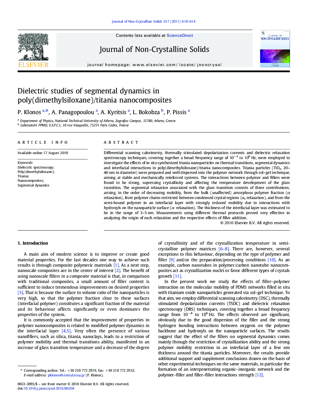 Dielectric studies of segmental dynamics in poly(dimethylsiloxane)/titania nanocomposites