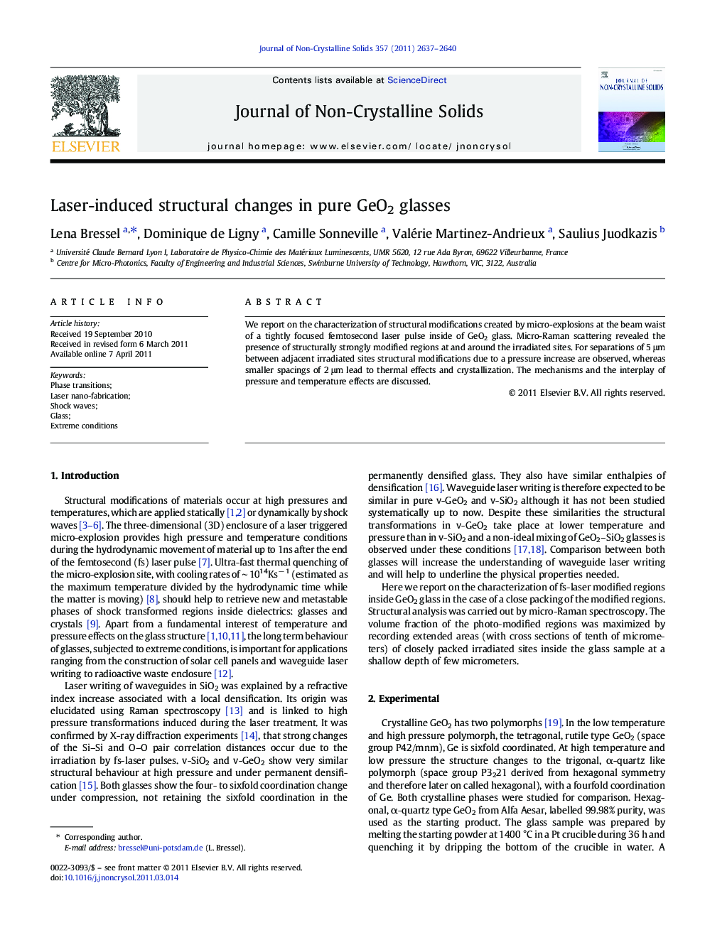 Laser-induced structural changes in pure GeO2 glasses