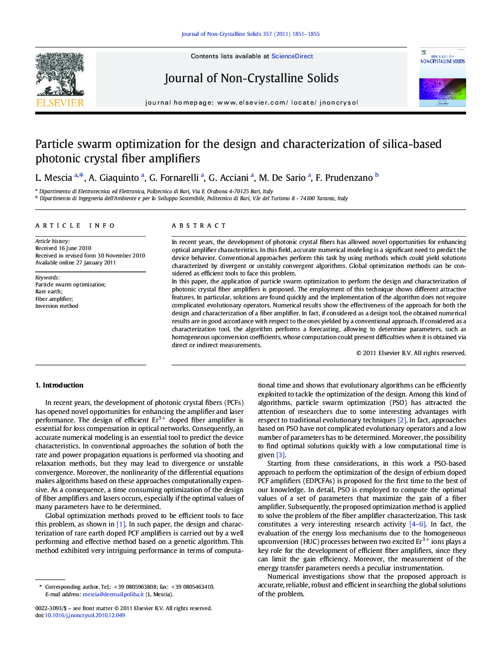 Particle swarm optimization for the design and characterization of silica-based photonic crystal fiber amplifiers