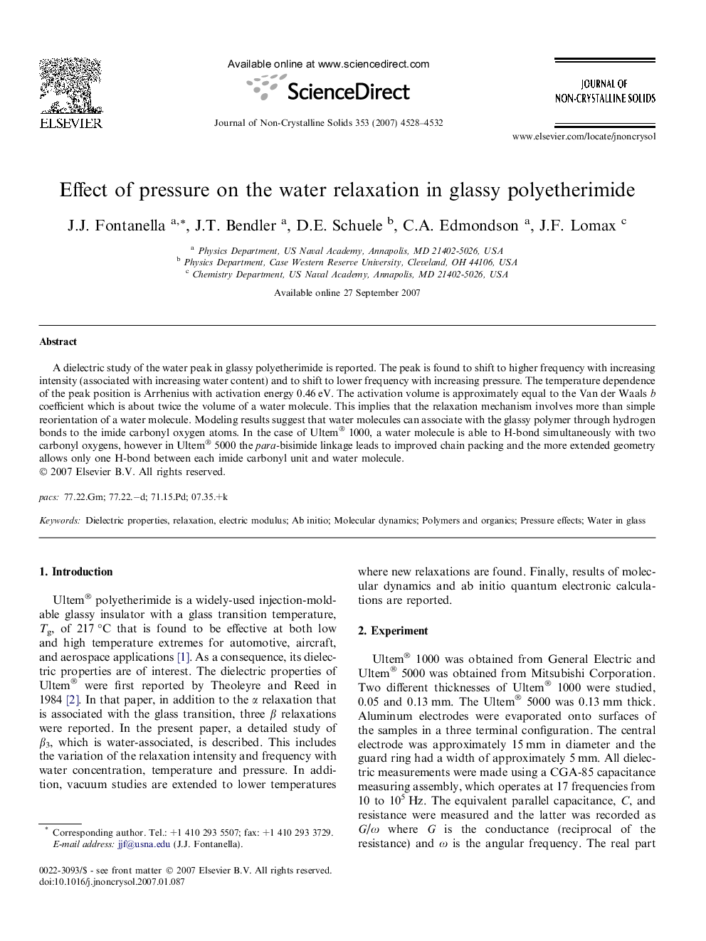 Effect of pressure on the water relaxation in glassy polyetherimide