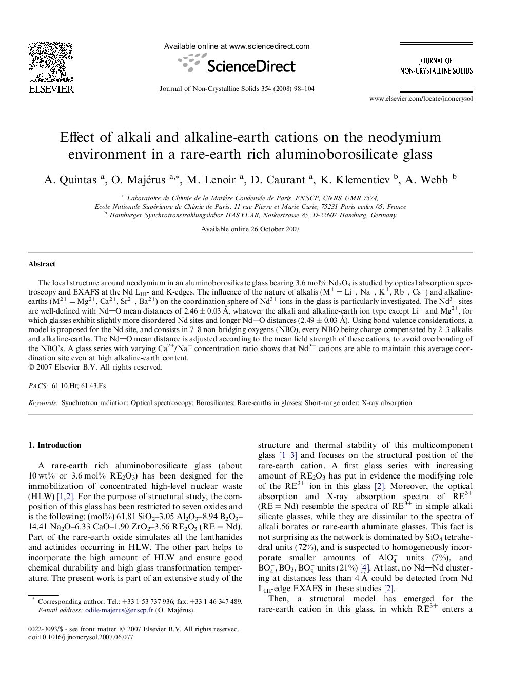 Effect of alkali and alkaline-earth cations on the neodymium environment in a rare-earth rich aluminoborosilicate glass