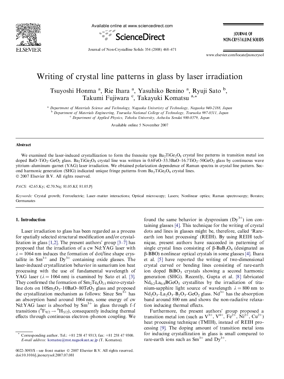 Writing of crystal line patterns in glass by laser irradiation