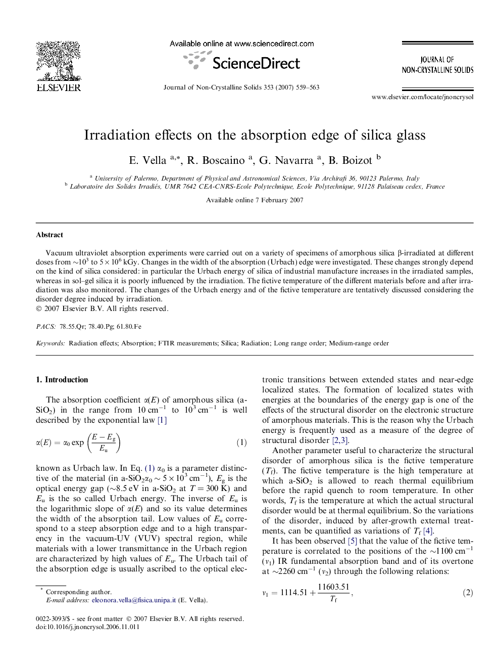 Irradiation effects on the absorption edge of silica glass