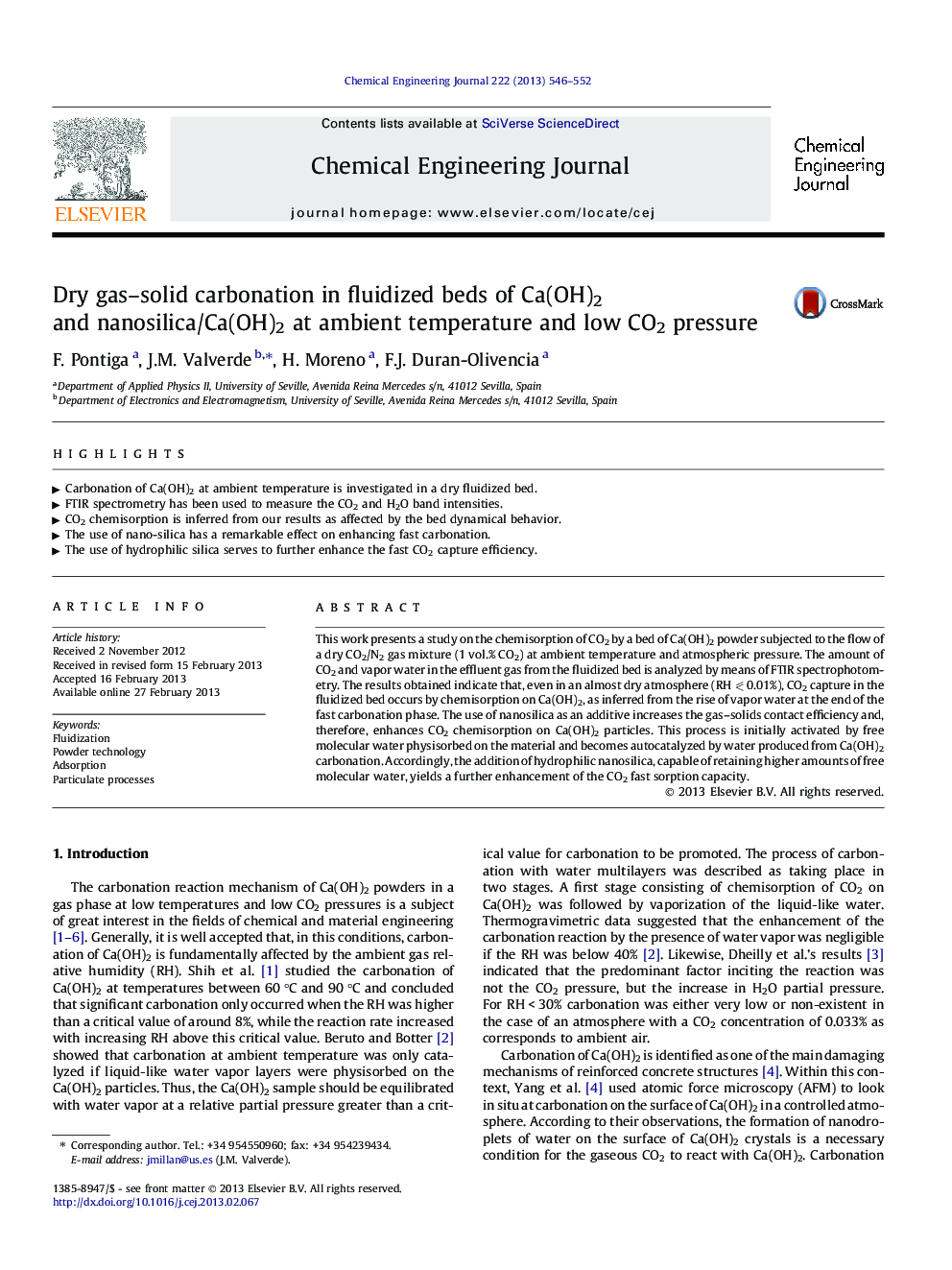 Dry gas–solid carbonation in fluidized beds of Ca(OH)2 and nanosilica/Ca(OH)2 at ambient temperature and low CO2 pressure