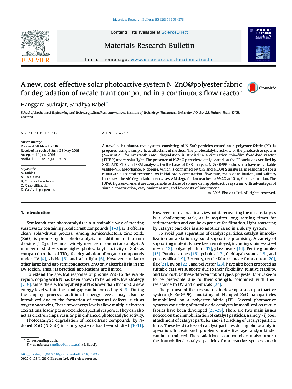 A new, cost-effective solar photoactive system N-ZnO@polyester fabric for degradation of recalcitrant compound in a continuous flow reactor