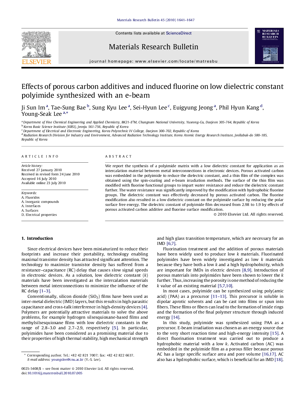 Effects of porous carbon additives and induced fluorine on low dielectric constant polyimide synthesized with an e-beam