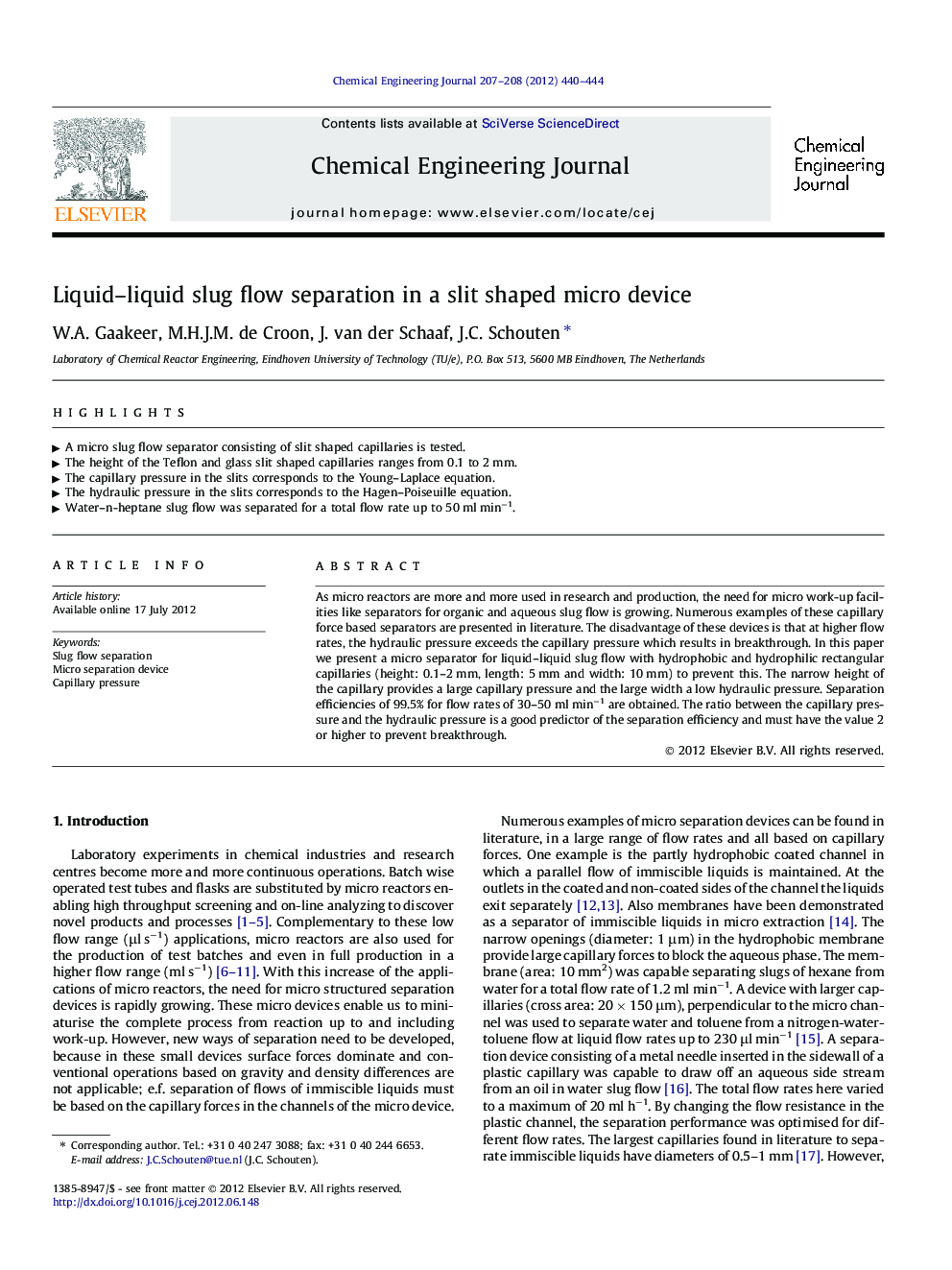 Liquid–liquid slug flow separation in a slit shaped micro device