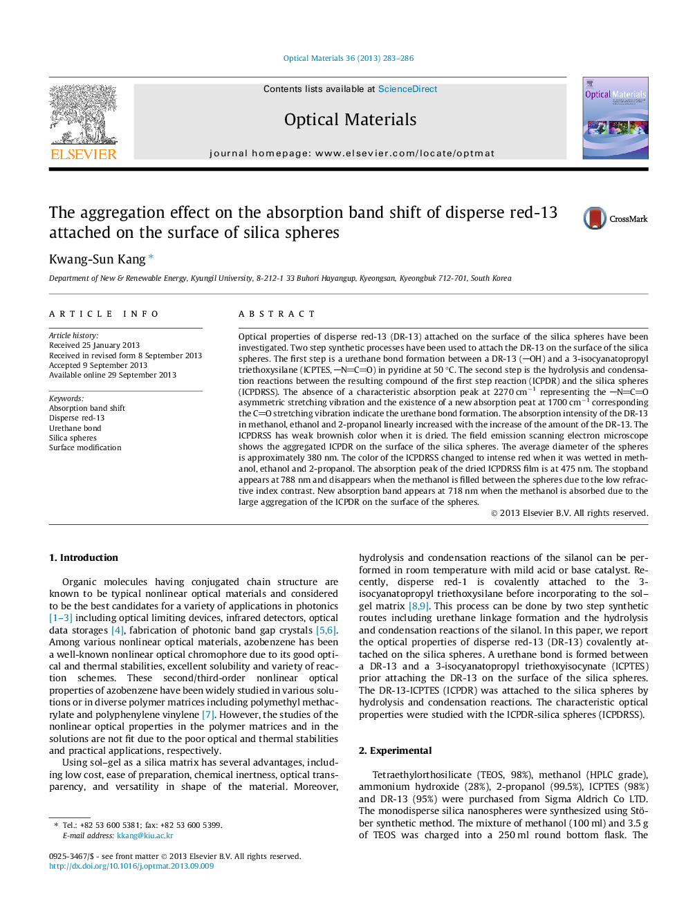 The aggregation effect on the absorption band shift of disperse red-13 attached on the surface of silica spheres