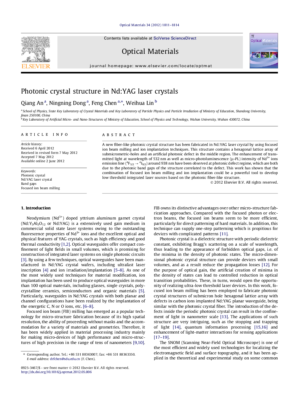 Photonic crystal structure in Nd:YAG laser crystals