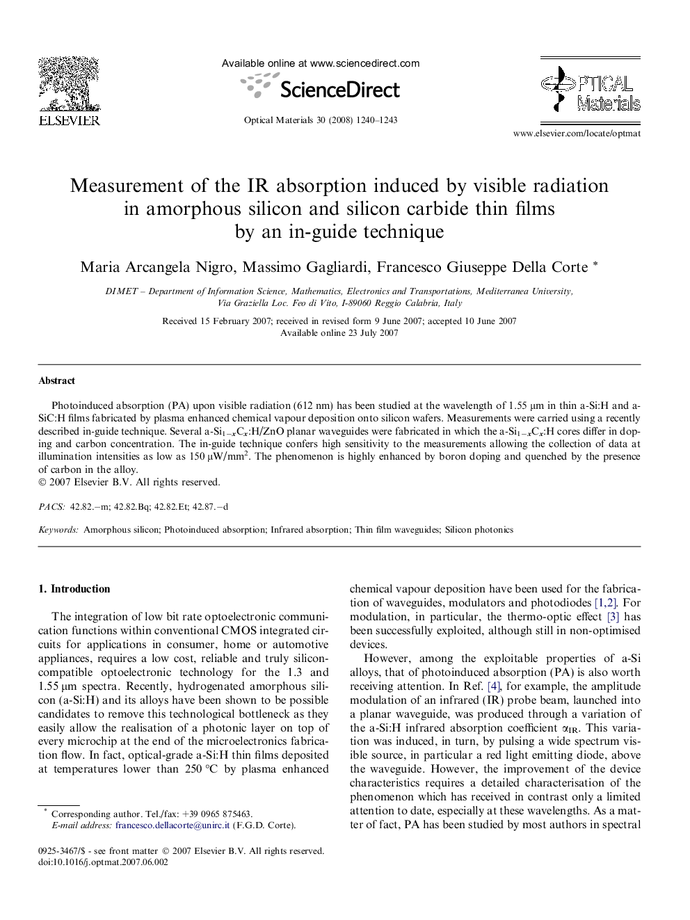 Measurement of the IR absorption induced by visible radiation in amorphous silicon and silicon carbide thin films by an in-guide technique