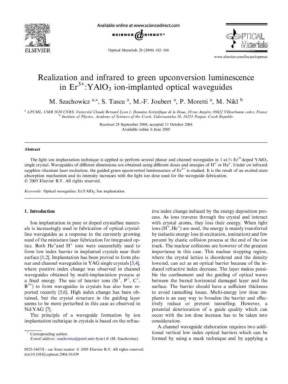 Realization and infrared to green upconversion luminescence in Er3+:YAlO3 ion-implanted optical waveguides