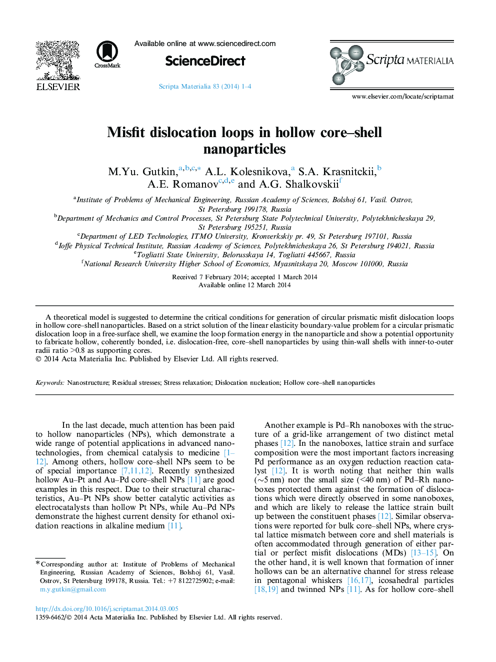 Misfit dislocation loops in hollow core–shell nanoparticles