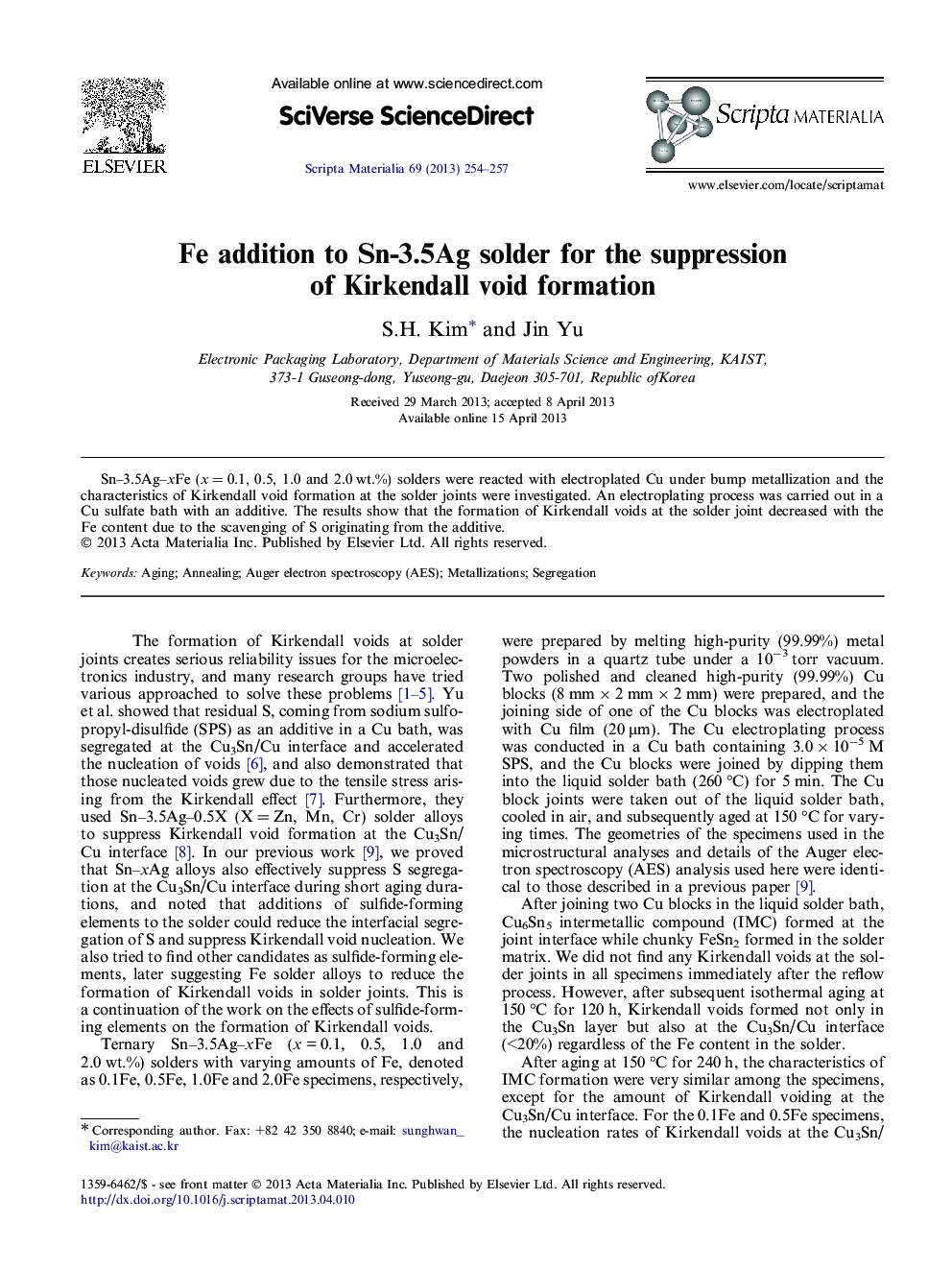 Fe addition to Sn-3.5Ag solder for the suppression of Kirkendall void formation