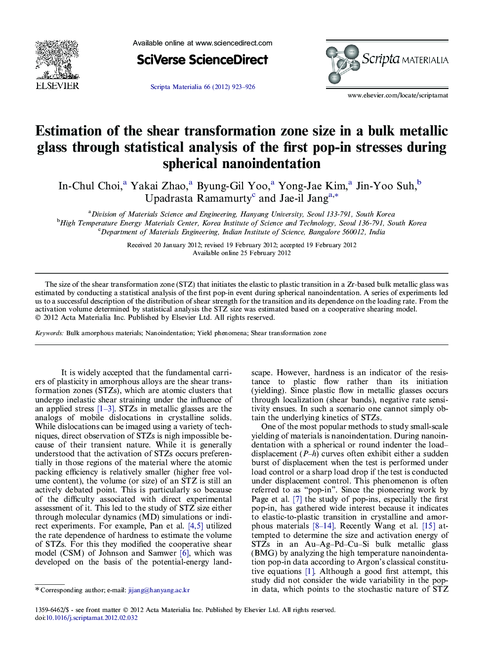 Estimation of the shear transformation zone size in a bulk metallic glass through statistical analysis of the first pop-in stresses during spherical nanoindentation