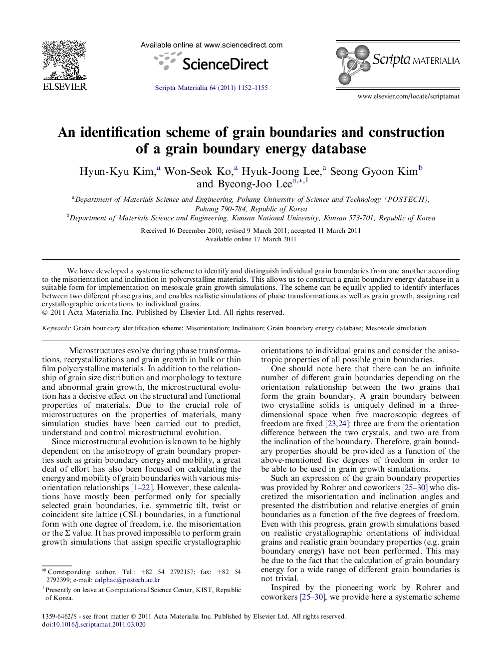 An identification scheme of grain boundaries and construction of a grain boundary energy database